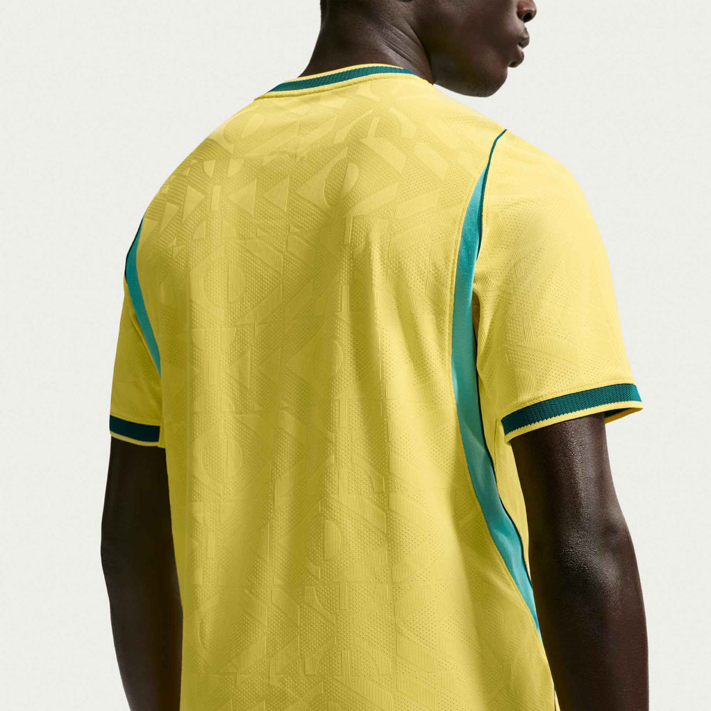 N Camiseta Local Auténtica Match Brasil NJR 2026 para Hombre (Amarillo/Verde Azulado)